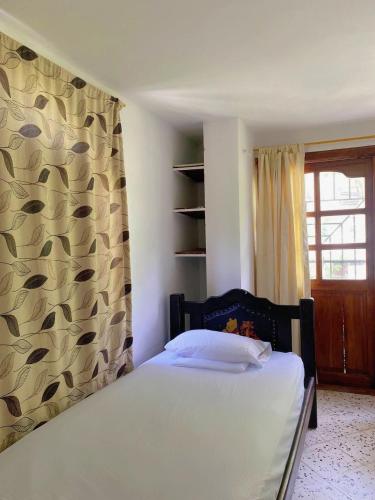 Katil atau katil-katil dalam bilik di Hotel Villa Mary apartaestudios playa