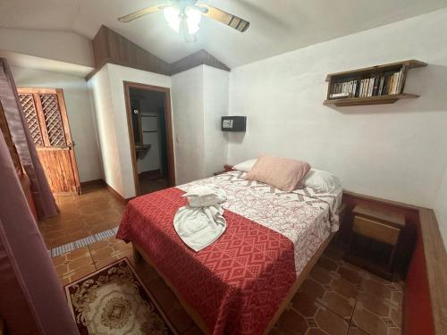 Ένα ή περισσότερα κρεβάτια σε δωμάτιο στο Hotel Don Quichotte