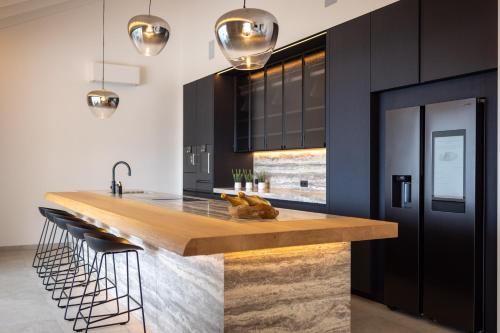 Kuchyň nebo kuchyňský kout v ubytování The Cape at Blue Bay Golf & Beach Resort