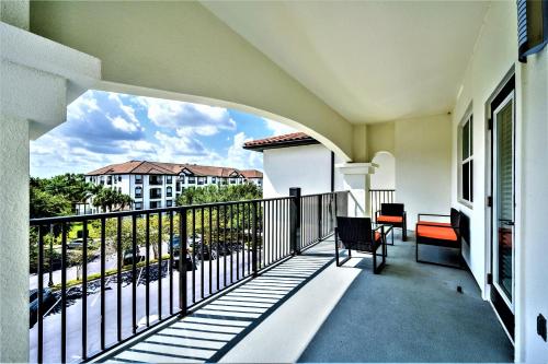 a balcony with a view of a parking lot at Vista Cay Resort by Millenium at Universal Blvd. in Orlando