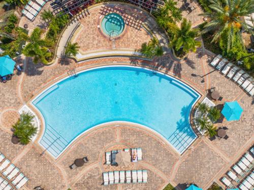 an overhead view of a swimming pool at a resort at Vista Cay Resort by Millenium at Universal Blvd. in Orlando