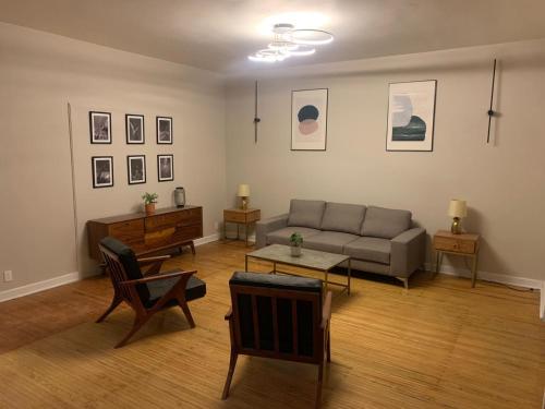 a living room with a couch and a table at Casa Mazonce in Mexico City
