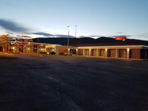 an empty parking lot in front of a building at Travel Inn in Duffield