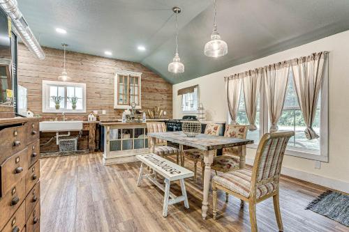 a kitchen and dining room with a table and chairs at Benton Harbor Home 3 Mi to Beach Grill and Yard in Benton Harbor