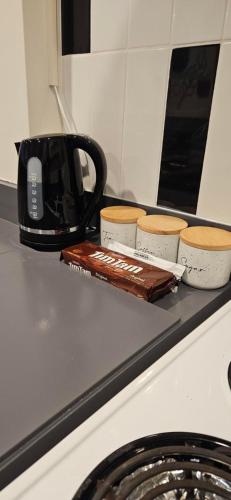 a chocolate bar sitting on top of a counter at Arty Apartments in Tauranga
