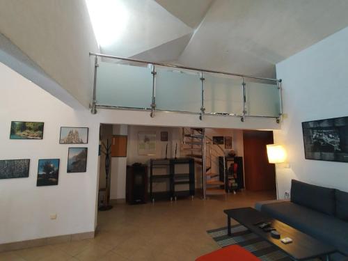 a living room with a glass shelf on the ceiling at Apartments by the sea Prizba, Korcula - 23527 in Blato