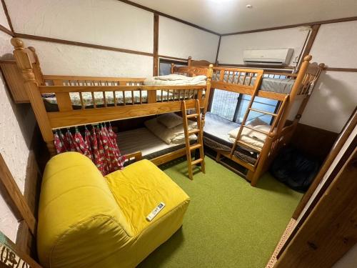 Ένα ή περισσότερα κρεβάτια σε δωμάτιο στο Kingyosou