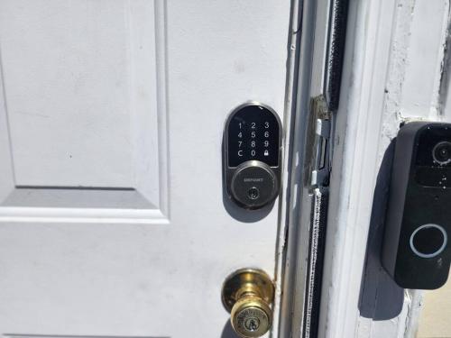 a close up of a door with a remote control at Spacious home away from home in Bloomfield