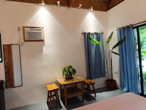 Postel nebo postele na pokoji v ubytování Helmina's Villas