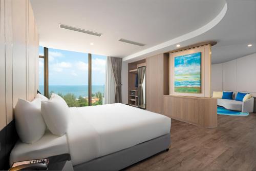 Cama o camas de una habitación en Poseido Hotel Quảng Bình