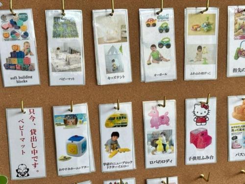 a group of pictures hanging on a wall at 汐の丸 in Imabari
