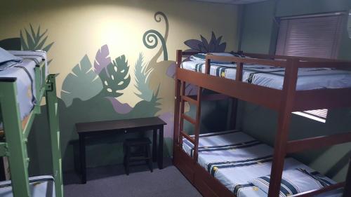 Letto o letti in una camera di Marco Polo Guest House
