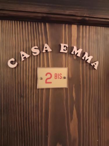 Casa Emmaに飾ってある許可証、賞状、看板またはその他の書類