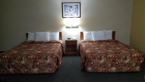Katil atau katil-katil dalam bilik di Rodeway Inn Blair