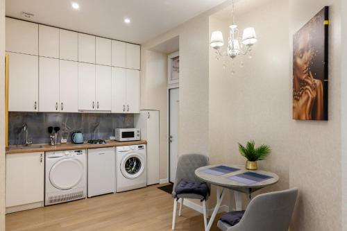 Kuchyň nebo kuchyňský kout v ubytování Luxury flat near Opera 2