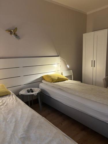 Posteľ alebo postele v izbe v ubytovaní Apartament Józefa