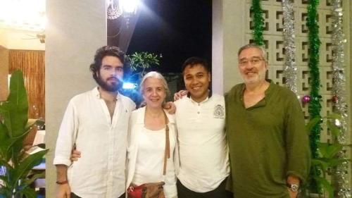 a group of four people posing for a picture at Lotus Blanc Homestay Villa in Battambang