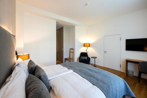 Postel nebo postele na pokoji v ubytování Hotel Edelweiss