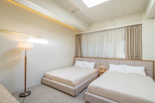 Postel nebo postele na pokoji v ubytování Room Tateyama