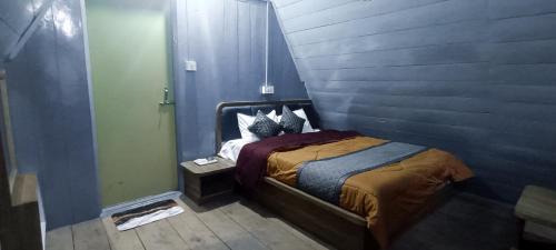 Postel nebo postele na pokoji v ubytování Kaamu Kabins Stay,