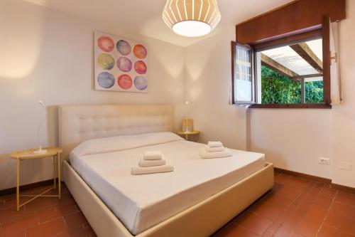 En eller flere senge i et værelse på Watercolor Loft