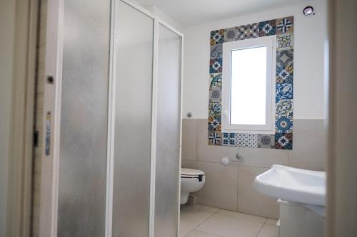 Ένα μπάνιο στο Albatros Apartments