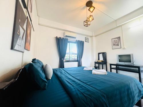Postel nebo postele na pokoji v ubytování Vang Vieng Santara Hostel