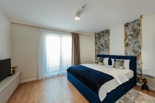 Postel nebo postele na pokoji v ubytování AWA Residence