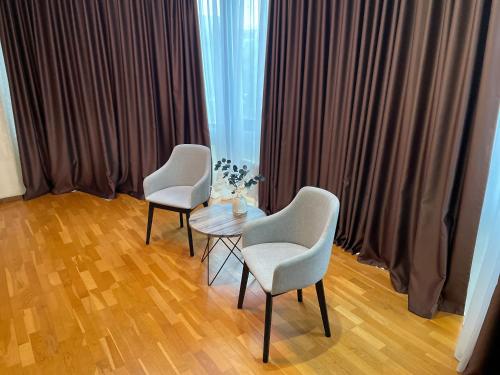 Posezení v ubytování Apart Hotel 5
