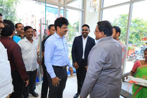 a group of men standing in a line at VANTARA SUITEs in Vellore
