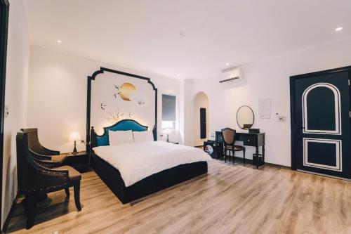Ένα ή περισσότερα κρεβάτια σε δωμάτιο στο Tam Coc Sana Villa & Homestays