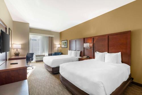 Ένα ή περισσότερα κρεβάτια σε δωμάτιο στο Comfort Inn & Suites