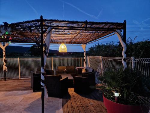 Patio nebo venkovní prostory v ubytování Un moment de détente