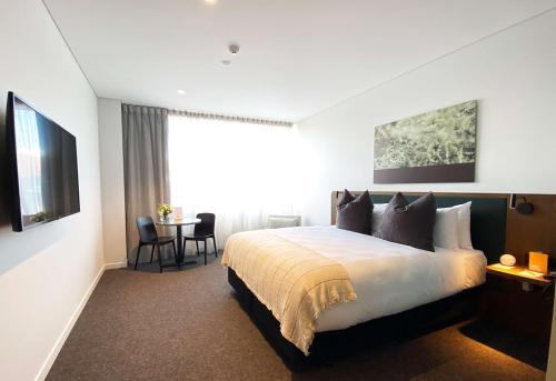 Cama o camas de una habitación en Sudima Queenstown Five Mile