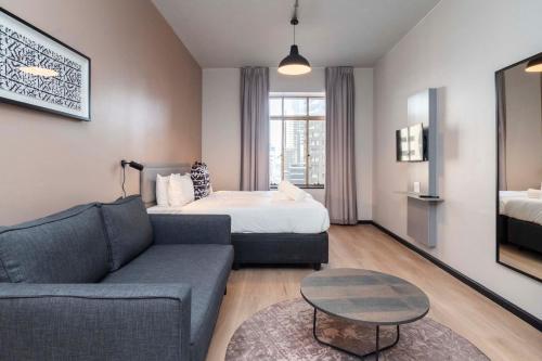 Postel nebo postele na pokoji v ubytování HAVN Aparthotel by Totalstay