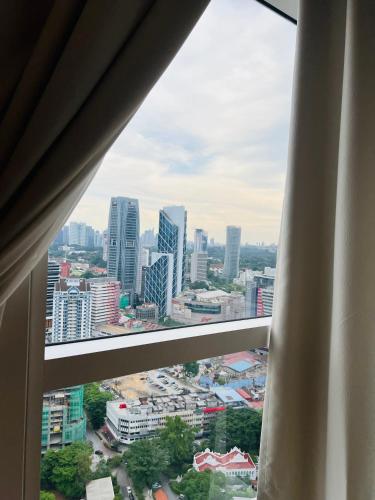 Pemandangan umum bagi Kuala Lumpur atau pemandangan bandar yang diambil dari apartmen
