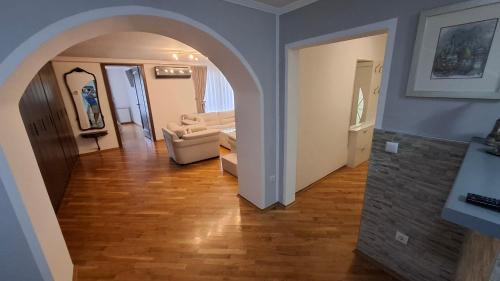 an archway leading into a living room with a couch at City Gate in Sarajevo