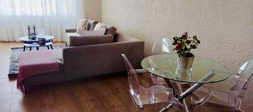 Posezení v ubytování Modern Apartment in Avenues Harare