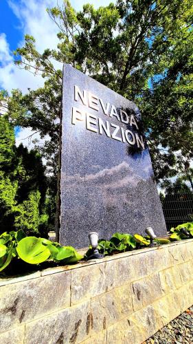 a sign for the new york fernovation at Penzion Nevada in Dunajská Streda