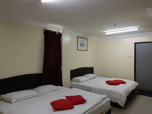 Postel nebo postele na pokoji v ubytování Casavilla Hotel