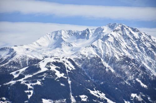 a mountain covered in snow with at Ferienhaus Enzian in Prägraten am Großvenediger
