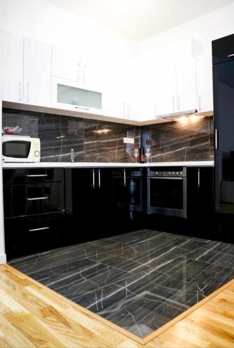Η κουζίνα ή μικρή κουζίνα στο Apartman Anika