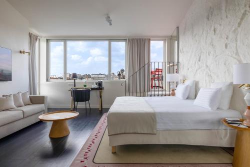 Postel nebo postele na pokoji v ubytování Hotel Astra Opera - Astotel