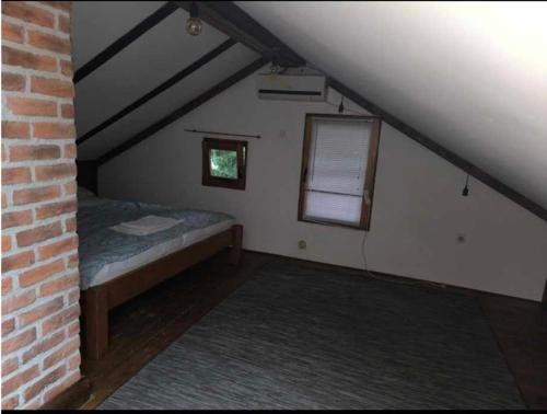 Ένα ή περισσότερα κρεβάτια σε δωμάτιο στο House apartment Baby L - near the Railway Station