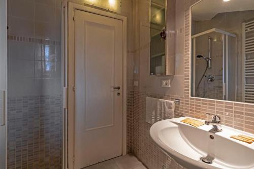 Ένα μπάνιο στο enJoy Home - Monolocale S Sofia sui tetti di Padova