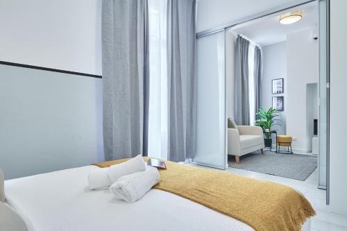 Ліжко або ліжка в номері Easylife - Milano - Casati 24 - Porta Venezia