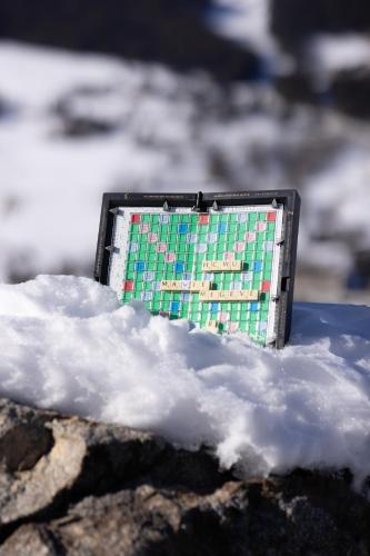 a wallet sitting on top of a pile of snow at Mamie Megève in Megève