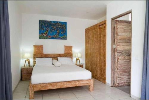 Ένα ή περισσότερα κρεβάτια σε δωμάτιο στο Villa Catta Seminyak