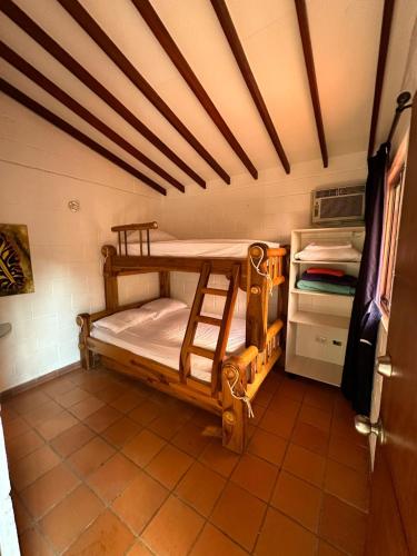 Postel nebo postele na pokoji v ubytování Cabaña ciudadela del sol
