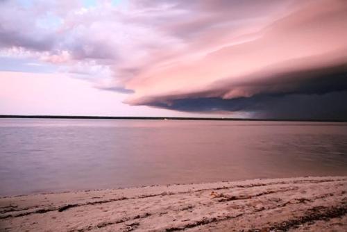 a view of the ocean with a cloudy sky at Crab Claw Island in Bynoe Harbour